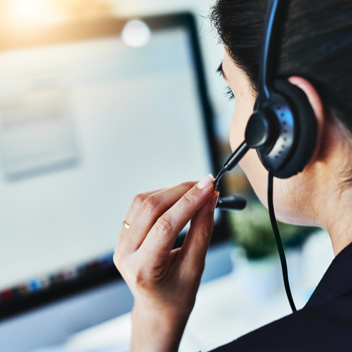Customer support specialist assisting a homeowner over the phone